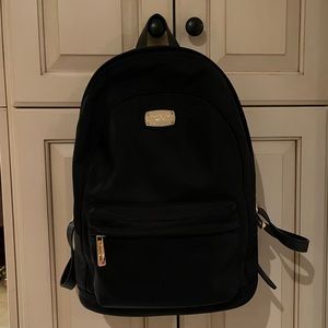 Michael Kors “Jet Set” backpack/purse